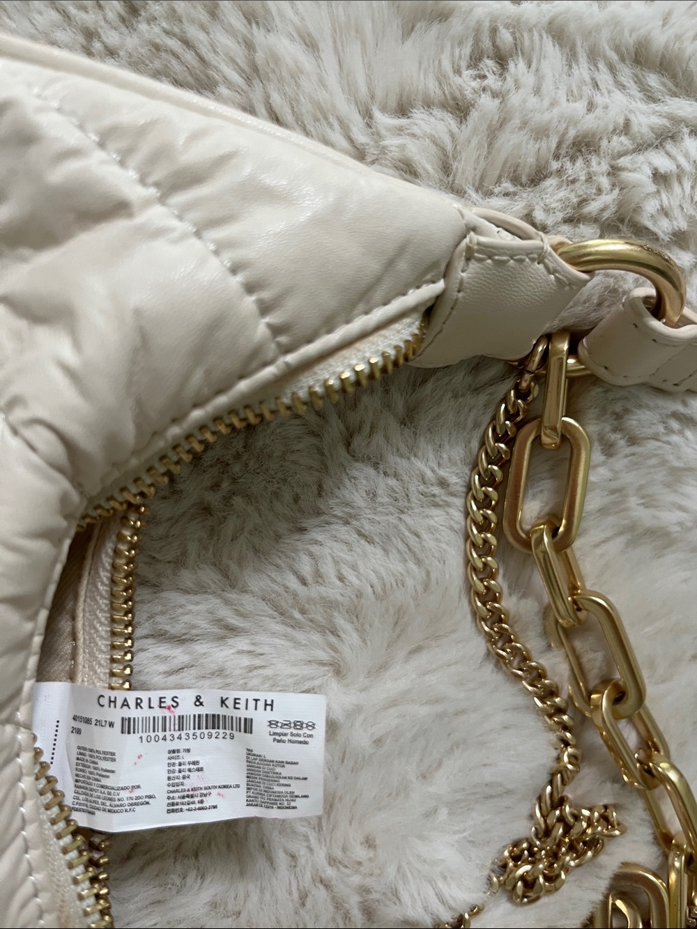 Charles & Keith Cream Quilted Crescent Bag with Gold Chains - Picture 9 of 9